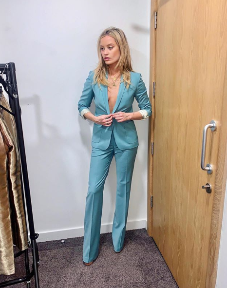 Love Islands Laura Whitmore poses without a bra in sexy blue power suit ...