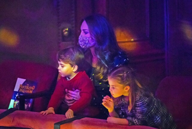 Mandatory Credit: Photo by Aaron Chown/WPA Pool/Shutterstock (11538817r)..Catherine Duchess of Cambridge with Prince Louis and Princess Charlotte attend a special pantomime performance at London's Palladium Theatre, hosted by The National Lottery, to thank key workers and their families for their efforts throughout the pandemic...Royal visit to The Palladium, London, UK - 11 Dec 2020