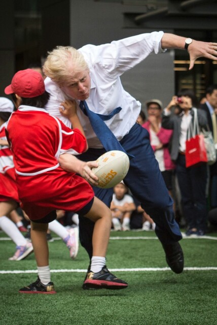 Boris Johnson collides with a 10 year old as the then London Mayor headed for the try line