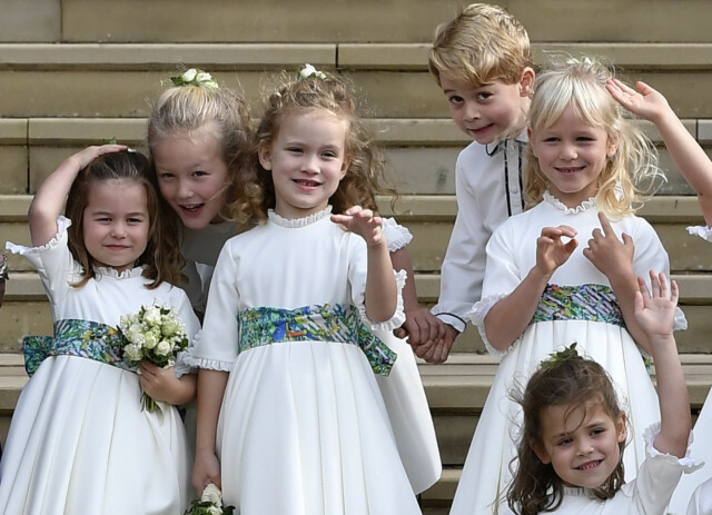 File photo dated 12/10/18 of bridesmaids and page boys, including Prince George and Princess Charlotte, waving as they leave after the royal wedding of Princess Eugenie and her husband Jack Brooksbank at St George's Chapel in Windsor Castle. PRESS ASSOCIATION Photo. Issue date: Thursday December 27, 2018. See PA story ROYAL Children. Photo credit should read: Toby Melville/PA Wire