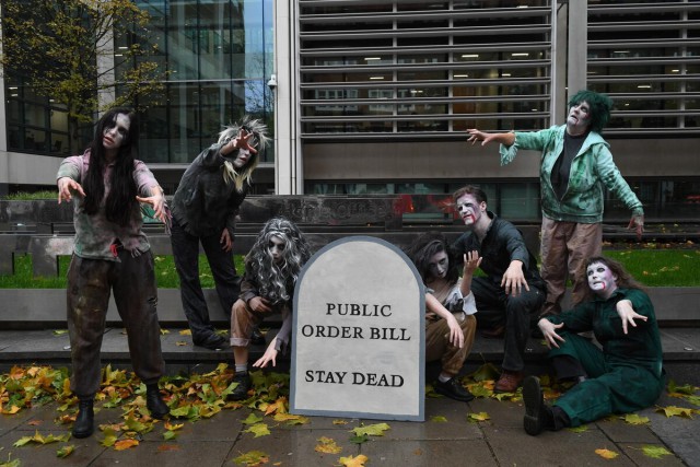 Alistair Strathern  third from Right

Zombies have descended on Westminster!..The Public Order Bill is a horror show of draconian laws that the UK government is trying to resurrect from the dead