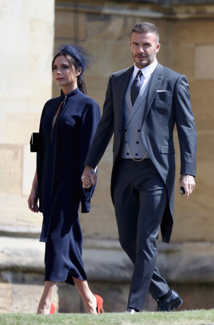 File photo dated 19/5/2018 of David and Victoria Beckham arriving at the wedding of Meghan Markle and Prince Harry. David Beckham has said he has learned to ignore the negative things that are said about his family, as he admitted that his marriage to Victoria is "hard work". PRESS ASSOCIATION Photo. Issue date: Sunday October 21, 2018. See PA story SHOWBIZ Beckham. Photo credit should read: Chris Jackson/PA Wire
