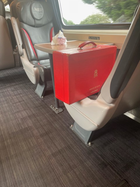 Immigration minister Robert Jenrick leaves his red box as goes to the toilet on LNER train from London to Retford on Friday 28th July., , Punters pic